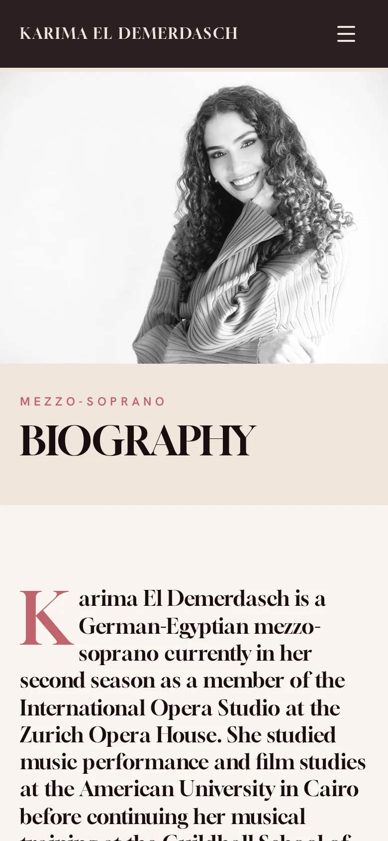 Mobile Biography page: monochrome portrait above the title and drop-cap text